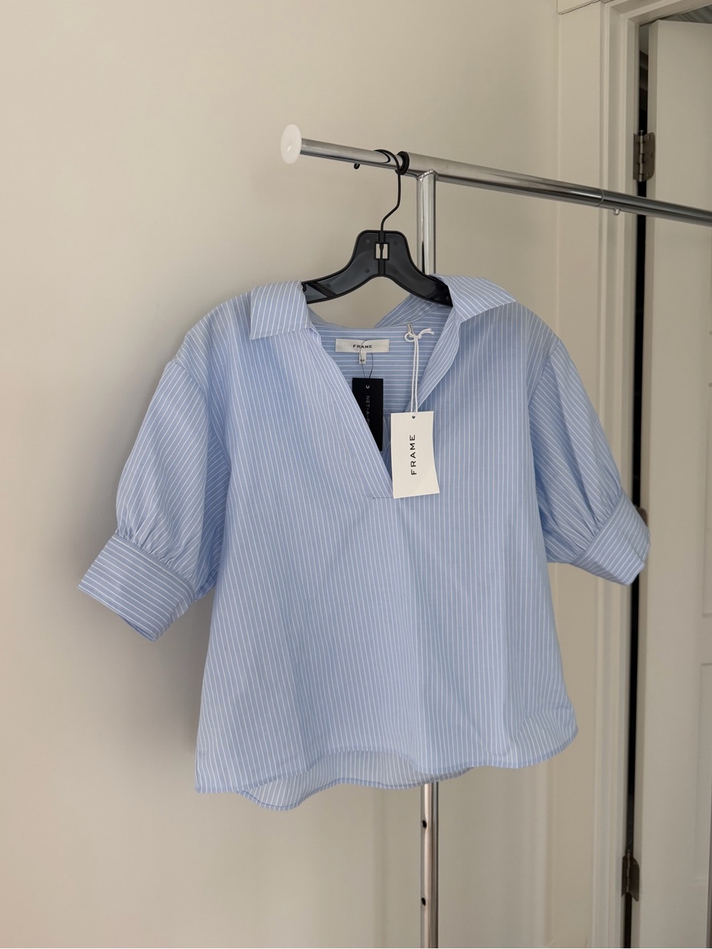Frame the striped v-neck popover top
